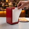 White 1-Ply Tall Fold Napkin 6.5" x 13" coming out of dispenser